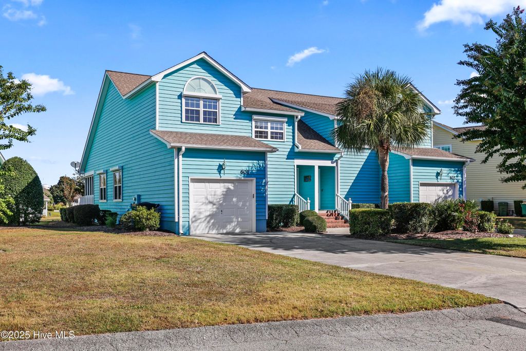 Photo of 601 Sloop Pointe Lane, Kure Beach, NC 28449 (MLS # 100532932)
