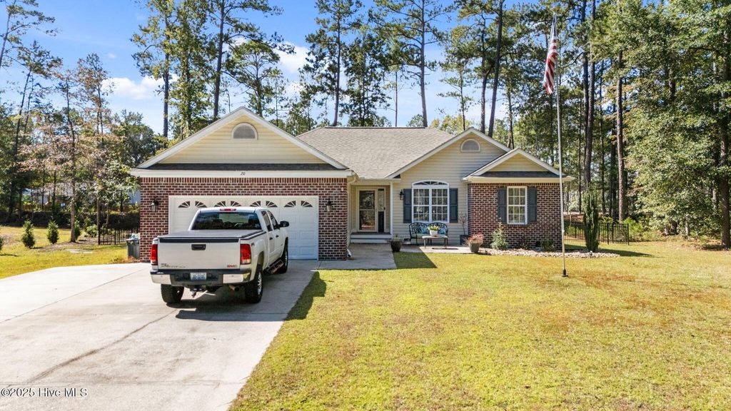 Photo of 20 Myrtlewood Drive SW, Carolina Shores, NC 28467 (MLS # 100536518)
