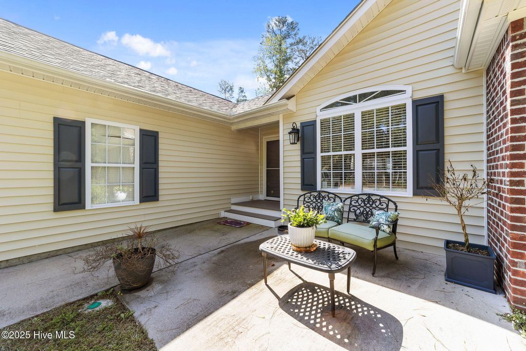 Photo of 20 Myrtlewood Drive SW, Carolina Shores, NC 28467 (MLS # 100536518)
