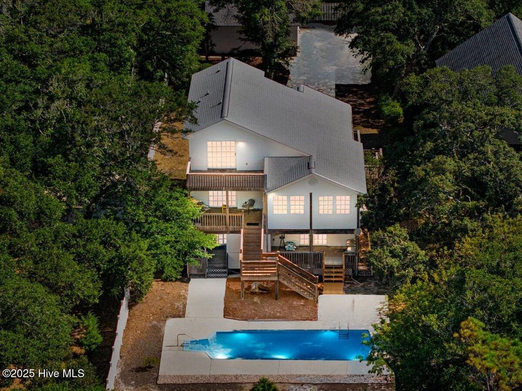 Photo of 117 SE 4th Street, Oak Island, NC 28465 (MLS # 100520195)