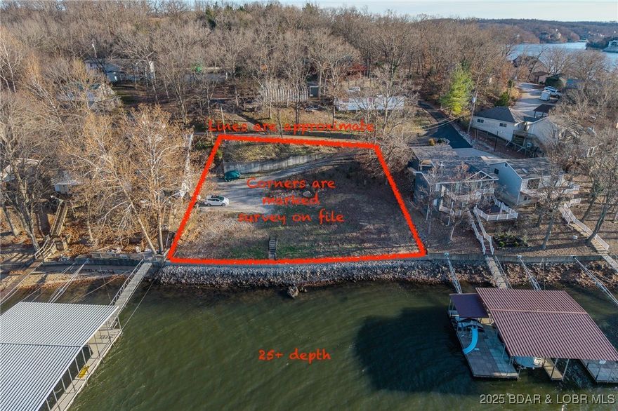 Rare Double Lakefront Lot in Highly Desirable Linn Creek Cove! Opportunities like this don’t come around often! This exceptional double lakefront lot offers 137 feet of pristine waterfront in a deep-water cove with excellent protection—while still capturing beautiful main channel views of the Four Corners. The perfect combination of privacy, scenery, and premium lake access. All the hard work has already been done for you. This property includes: New seawall and riprap for long-term shoreline security,  engineered septic system configuration, current survey, house plans and dock plans already completed with room for a large dock thanks to generous water frontage and deep water. Whether you’re envisioning a luxury retreat or a full-time lakefront dream home, this rare offering provides a true “build-ready” experience in one of the most sought-after areas at Lake of the Ozarks. Bring your builder and start making your lake life vision a reality!