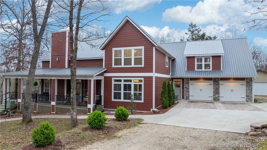 A private lake retreat nestled on 6 acres of gentle ground! This unique home offers privacy from lake chaos, yet sits just 10 minutes from Camdenton for quick access to everything. The home offers many desirable features that you rarely see in today's modern construction - 3/4 inch pine wood floors, pine wrapped walls, covered pavilion w/ outdoor kitchen, gated entry onto the property, 42k btu gas fireplace, wrap around porch w/ aluminum railing, pool, & hot tub. The home sits at 3,646 SqFt, offers 4 bedrooms/5.5 bathrooms, each bedroom is an ensuite - one of which is a standalone apartment, & has main level living. The primary suite is a dream w/ heated floors & towel bar, cedar wood tub, Kohler sinks, walk-in tiled shower, & a barn door entrance. The kitchen offers a duel range(gas top & electric oven), commercial sized refrigerator, 2 sinks w/ 2 inch pipes, walk in pantry & formal dining & sitting rooms. The down stairs presents a second entertainment area with a full bathroom, while the upstairs is where the final 3 ensuites are. Please note, property can also be purchased with 9.10 total acres(see MLS 3583506). Come check it out!