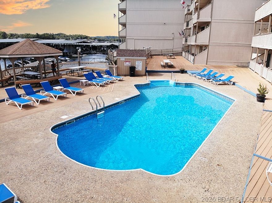 Welcome to this Beautifully Updated Lakefront Condo! 
Located @ One of the Hottest Spots on the Lake! 
Directly across from H.Toads, Shady & Lazy Gators offering Food, Entertainment, Stores & Swim up Bars!
--This unit sits poolside overlooking the main pool & the lake & is also handicap accessible. 
**Featuring Custom Cabinets w/Granite counter-tops, center-island, SS Appliances, a mini-bar, pendant lighting, newer fixtures & LVP flooring throughout the main, Extra tall ceilings & so much more! 
**The Master Bedroom Suite is huge & walks out to the patio, Master Bath is updated w/a double sink vanity, tile flooring throughout & tile surround w/a walk-in shower. Hall bath beautifully updated as well!
**TURN-KEY ** Comes Fully furnished
**The dog park is next to building, Trailer parking allowed, accessible ramp out the back & you may purchase a garage, pwc or boat slip as they become available. 
**Walk across the street to Camden / H. Toads, Lazy & Shady Gators & Across the cove is Alhonna (Resaurant, Docks & Indoor Pool)
**Cove is calm, great for paddle boarding / fishing 
**Across the Main Channel is Tap & Grill & you can go in either direction for many addtnl options!