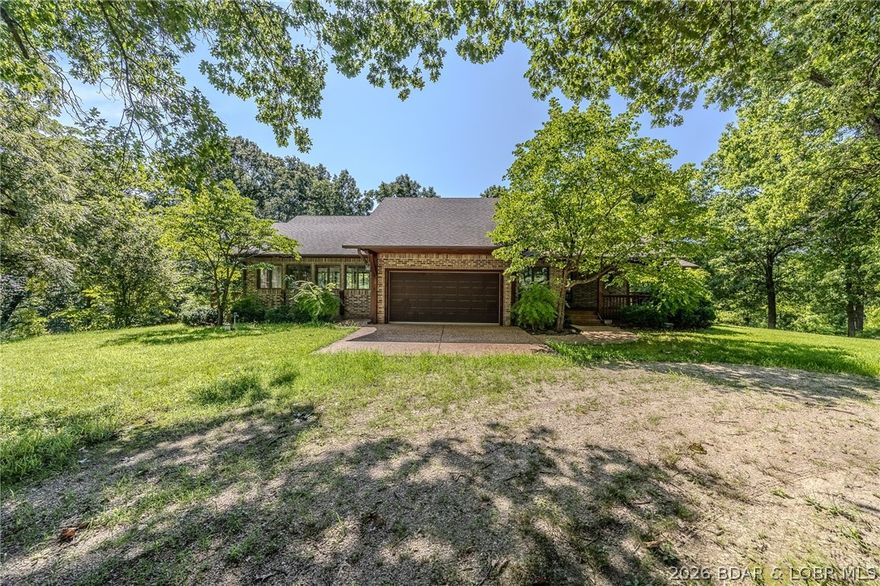 Nestled just a few miles outside of Barnett, Missouri this remarkable 42 acre property offers both privacy and versatility in a serene wooded setting. Surrounded by mature timber and gently rolling terrain, the land provides a perfect mix of open clearings and dense forest ideal for those seeking peace, recreation, or a multi-family living arrangement. This property features two well-maintained homes each with a unique character and comfort. The main residence offer spacious living areas modern amenities and large windows that bring in natural light while framing views of the surrounded woodland. A second home sits a comfortable distance away, perfect for extended family guests or potential rental income. Both residences are move in ready and share access to the properties private drive and ample open space for gardens, outdoor gatherings, or additional development. Nature lovers will enjoy abundant wildlife and the tranquil atmosphere that only a property of this size can provide.  Despite its privacy and seclusion, the location is incredibly convenient- just minutes from Barnett's amenities and within easy reach of Lake of the Ozarks for fishing, boating, and shopping.