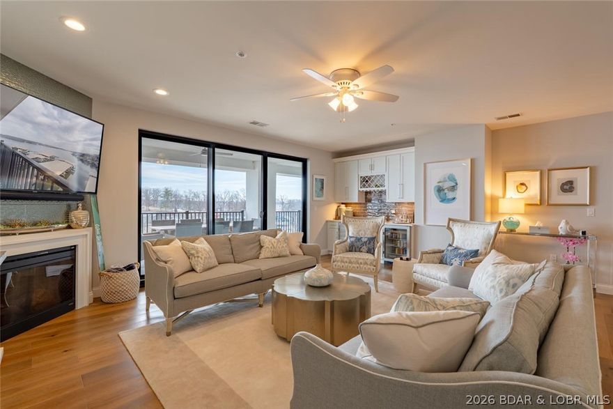 Ultra-luxury lakefront living at Cypress—recently repositioned by $100K, creating an exceptional opportunity for buyers who recognize value. This 4 bed, 4.5 bath condo offers a rare, hard-to-find layout with every bedroom ensuite and lake views from both sides. Two east-facing lakeside suites function as true primary retreats, while two west-facing bedrooms capture stunning sunset views. The open-concept living space showcases high-end finishes, elegant built-ins, wet bar, large pantry, and full-size laundry—professionally decorated and further enhanced by seller upgrades that truly take this unit over the top. The expansive lakeside lanai delivers front-row views of the water and is ideal for entertaining. Included is a 14x40 boat slip with 20,000 lb hoist and custom touchless cover. Cypress amenities are second to none, featuring onsite management, infinity pool, fire pit, Green Egg and gas grills, custom cabanas, dog park, private wine locker, 24-hour gym, keyless entry, smart thermostats, and zero-step elevator access. Opportunities like this—at this level and price—are rare at the Lake.