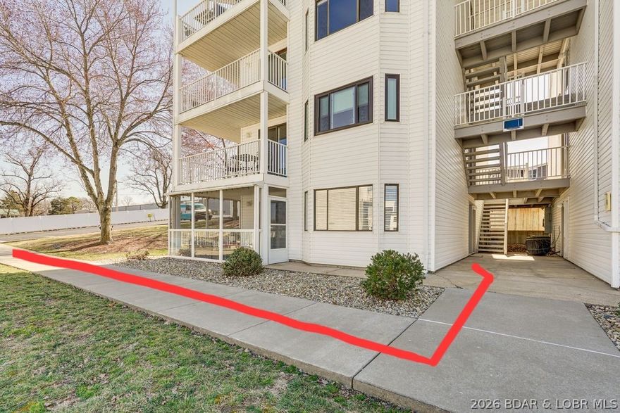 Location, location, location! This stunningly renovated 2 bed, 2 bath turn key unit is practically like new with its extensive list of updates not to mention you can walk from the parking lot to the door with NO STAIRS! Relax in the screened, covered patio with a sliding door to the kitchen for a snack or out the patio door to the pool just steps away. Fantastic lower level, corner, walk-in unit with large grass area for the kids or dogs to play. Kitchen boasts new quartz counters, stainless appliances, low profile microwave, convertible bar island that expands for additional counter space, tile backsplash, & washer/dryer. Be sure to see the long list of updates throughout the condo in the documents tab. This unit has been utilized as both a family happy retreat as well as rental investment and the unique 2nd door entry would allow one to lock off the 2nd bed/bath area with its own entrance should the owner want to live in their part and rent the other with the lock-off smart layout design. (Door to do so is in the storage area). Incredible zero entry pool with multi-lighted waltzing waters at night. PRIME location by land and water ready for you to start enjoying the lake life!