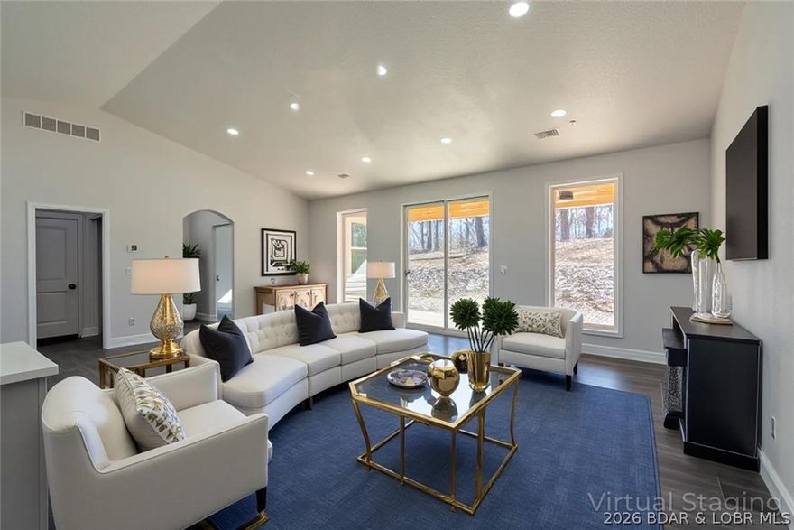 Enjoy main-level living in the highly sought after Porto Cima community. This 3 bedroom, 2 bath home features an open concept floor plan ideal for both everyday living and entertaining. The kitchen offers a modern design with under cabinet lighting, stainless steel appliances, walk-in pantry and flows seamlessly into the living and dining areas. The master suite includes a custom walk-in closet, plus an oversized shower with gorgeous floor to ceiling custom tile. The 2 additional bedrooms provide flexibility for guests or a home office. This all-electric home also features an on-demand water heater for added efficiency and convenience, and a water softener. Not only is this home located on a quiet and serene street in Porto Cima, the POA owns the lot behind the home which provides a private wooded setting. **BUILDER IS PROVIDING AN ALLOWANCE so you can select your own custom master closet shelving system, master shower door and custom kitchen pantry shelving. (see attached details).**