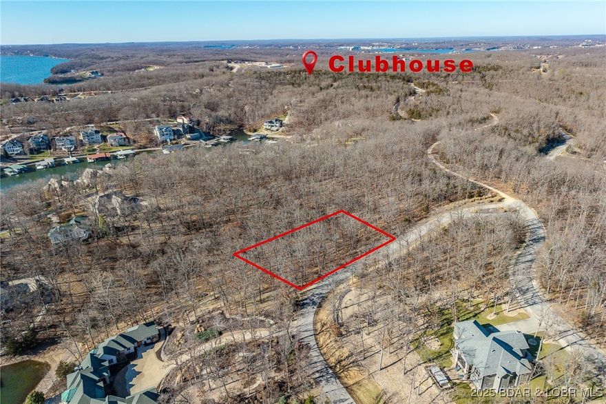 This Lakeview lot at The Villages at Shawnee Bend offers scenic views of the Lake of the Ozarks paired with the amenities of a premier master-planned community. Enter through the striking grand waterfall entrance and experience a neighborhood designed for both relaxation and recreation. Homeowners enjoy a welcoming clubhouse, multiple community pool, championship tennis courts, and pickleball facilities, as well as parks, and playgrounds. With paved roads and underground utilities in place, this lot is ready for a thoughtfully designed home that captures the lake views while embracing a vibrant, resort-style atmosphere.
