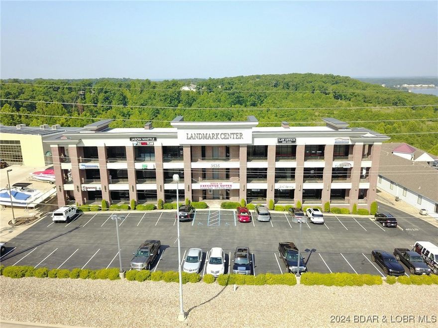 Discover an exceptional opportunity to purchase office space in the stunning brick Landmark Building, recognized as one of the prominent office complex in town. Centrally located and surrounded by professional tenants, this space offers both prestige and convenience for your business. The unit is thoughtfully designed with three private office areas, a spacious conference room, a large storage area, and a private bathroom. It also features a kitchen equipped with appliances, all neutral color palette, providing a functional and customizable workspace. All brick and steel construction. Its prime location ensures the highest traffic counts in the area, local amenities, and a thriving professional community. Whether you are in an established business or a growing enterprise, this space combines affordability, functionality, and a highly sought-after address. Don't miss this rare chance to elevate your business in this iconic building.