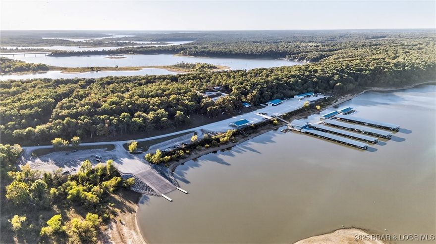 Welcome to Bucksaw Resort & Marina—one of only five marinas on the historic Harry S. Truman Reservoir, Missouri’s largest man-made lake. This turnkey lakeside resort offers multiple income streams and a strong reputation for clean facilities and exceptional guest experiences. Bucksaw features a full-service deepwater marina with 198 covered slips and fuel dock; diverse lodging including cabins, motel rooms, floating kitchenettes, and 100 RV sites; a floating restaurant; a stocked marina store and tackle shop; event hosting for tournaments, weddings, and reunions; guide services; and boat rentals. Set in a quiet cove just 15 minutes from Clinton and 25 minutes from Warsaw, it provides peaceful lake living with convenient access to nearby towns. Current owners have built a reliable team and streamlined operations, making this a rare chance to own a thriving, lifestyle-driven business in one of Missouri’s most beloved outdoor destinations. Serious inquiries welcome!
