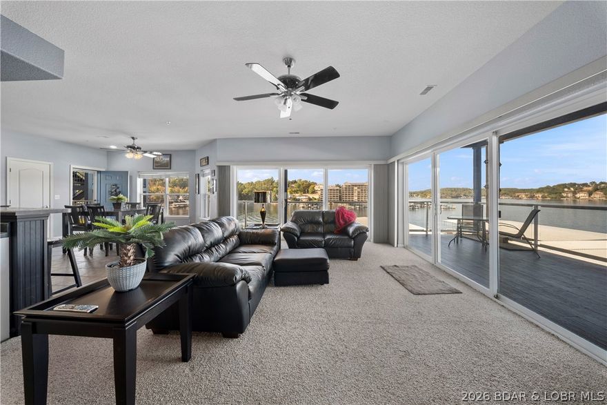 Welcome to effortless lakefront living at this beautifully updated, turnkey, 3-bedroom, 3-bath condo—where style meets relaxation at the 2 MM of Lake of the Ozarks. This unit is designed for comfort and entertaining, featuring a bright, open-concept floor plan with windows that frame stunning main channel views. The kitchen and living areas flow seamlessly onto a generous lakeside deck, perfect for enjoying morning sunrises or weekend gatherings with friends. Each bedroom offers privacy and comfort, while tasteful finishes and furnishings make this home completely move-in ready. Plus, a 16x42 boat slip is included, making every lake day simple and convenient. The sought-after complex offers three beautiful pools and unbeatable proximity to popular restaurants, shopping, and lake attractions. Whether you’re searching for a year-round home, vacation getaway, or smart investment, this condo delivers exceptional value and a true lake lifestyle. Just bring your bags and start making memories!