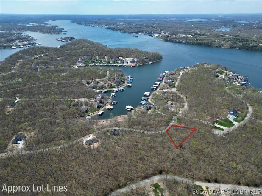 Discover the perfect setting to bring your dream home to life in the highly sought-after Porto Cima community, located within the desirable Grand Point subdivision. This spacious vacant lot offers an excellent opportunity to build in one of the lake’s most prestigious and well-established areas. Surrounded by beautiful homes and a peaceful atmosphere, the property provides the ideal balance of privacy and convenience. Porto Cima is known for its upscale amenities and easy access to everything Lake of the Ozarks has to offer, making lake living both effortless and enjoyable. Whether you’re planning a full-time residence or a vacation retreat, this property offers the flexibility to create a home that fits your vision. Enjoy the tranquility of a quiet neighborhood while still being just minutes from golf, dining, marina access, and more. Don’t miss this opportunity to secure a prime piece of land in one of the lake’s premier communities.