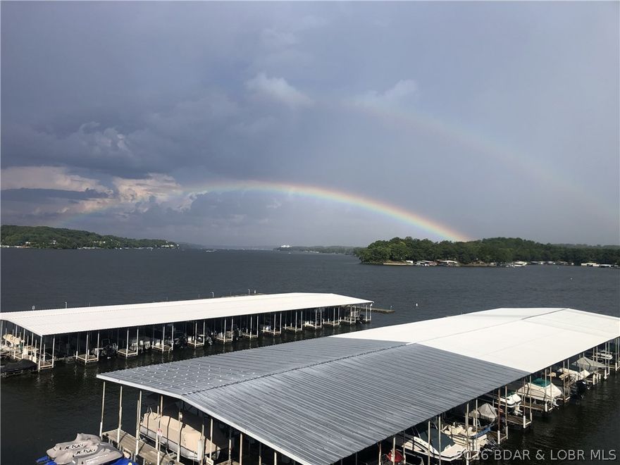 Wake up to stunning lake views in this beautiful 4-bedroom 3-full bath condo at the Lake of the Ozarks. Designed with comfort and entertaining in mind, the open living area flows seamlessly to a private balcony overlooking the water-perfect for morning coffee or sunset evenings. The spacious layout provides plenty of room for family and guests, while the community offers wonderful amenities that includes, pool, clubhouse, game room, tennis and more! Whether you're looking for a weekend escape or full-time residency, this lakefront condo delivers the ultimate Lake of the Ozarks lifestyle.