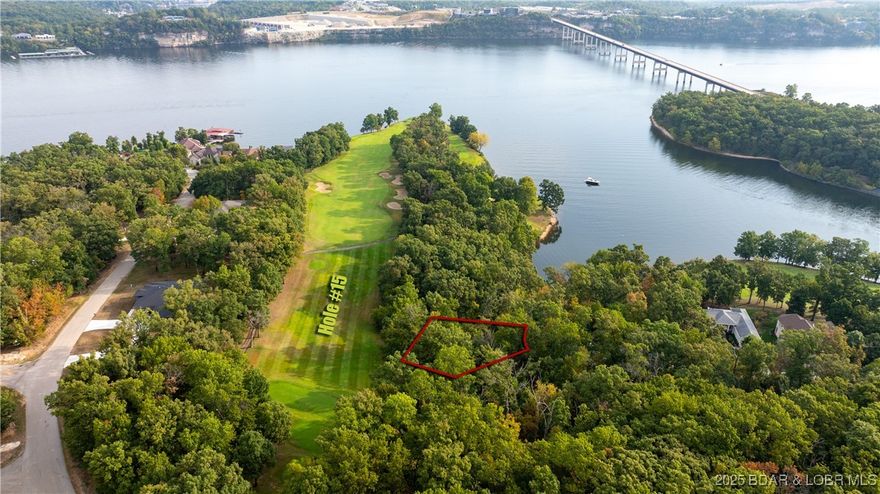 Have you ever wanted to live on a golf course? Well look no further! This .30 acre lot sits right on the signature 15th hole at The Club at Porto Cima. Situated in an upscale area and at the end of a cul-de-sac, this lot provides the perfect opportunity to build your dream home or sit on an investment as the area continues to grow. The area is quiet, but you can quickly get to Osage Beach dining and shopping within 10 minutes. Water, sewer, and electric are available as well as Porto Cima's amenities. Get a golf membership or sign uo to get on the list for Porto Cima's marina nearby. Come check out this great opportunity today!