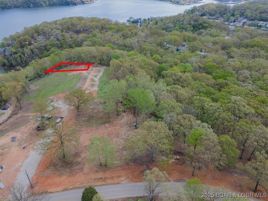 Build your dream home on this beautiful 0.33-acre lot with serene lake views and gentle terrain-perfect for easy construction. Located in Osage Heritage subdivision, this property offers a peaceful setting with modern conveniences already in place. Choose from our thoughtfully designed home plans or bring your own vision to life. A Rare opportunity to create a custom home in growing, desirable community!