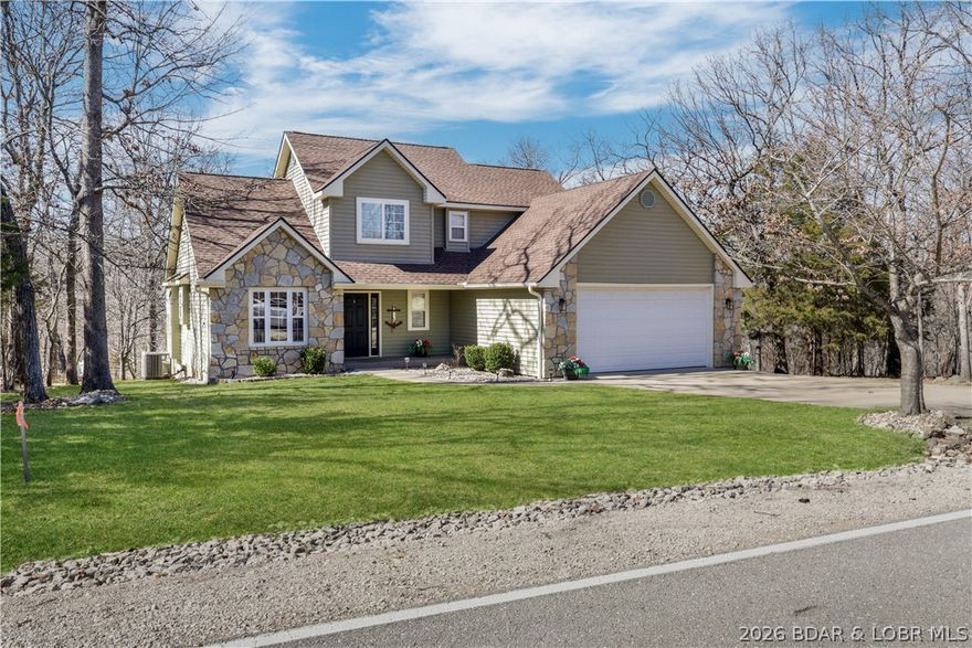 Luxury living in the exclusive Four Seasons community awaits you in this impeccably updated 3-bedroom, 2.5 bath  residence. From the moment you step inside, a sense of sophistication, warmth, and refined comfort, greets you. Featuring towering ceilings, elegant hardwood floors, and a main-level bonus room that could be used as an office, extra bedroom, or den, this stunning home will certainly check all your boxes. The newly updated kitchen features gorgeous quartz countertops, showcased by a custom tile backsplash, newer appliances, updated cabinets, and a plethora of natural light. The heart of the home unfolds on the main floor, offering a seamless flow between living and dining areas, where every essential space flows seamlessly for the ease of one-level living. Unparalleled privacy awaits in your fenced backyard, which backs up to Four Seasons' "Green Space" (where no one will be able to build in the future). Includes an additional adjacent lot for future expansion if desired.  Four Seasons amenities offer bike/hiking trails, pools, tennis, skate park, fitness, camping, and a boat launch for easy Lake access. Reach out today for your personal tour of this amazing home.