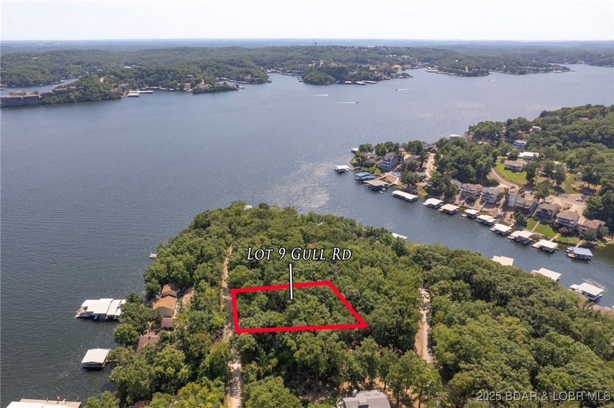 Enjoy the close to town location and great lake view from this wonderful estate-sized building site. Nearly 1/2 acre with plenty of trees gives you the perfect piece of heaven to build your lake get-a-way or full time home. City of Lake Ozark utilities available. Located within minutes from Osage Beach, Lake Ozark and Eldon, you will love this location! Access easement off driveway if wanted. Call now to view this amazing property.