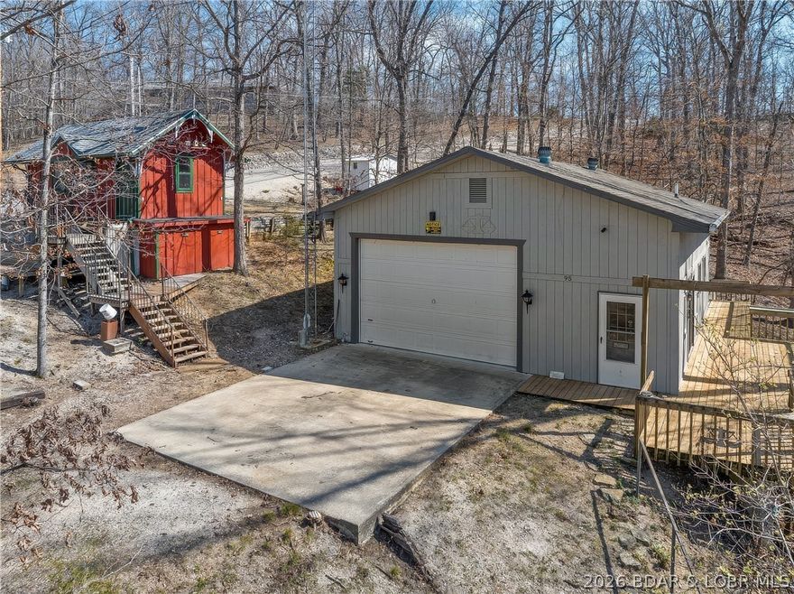 Great property for a Hobby Shop, Boat Storage or week-end getaway for a Mini-Home. Shop Building has an open Deck with Sliders that go into a small Kitchen.  There is a Bathroom and Laundry room and an area that could be set up with a small living space.  A new Mini-Split was installed 11/2025.  This Building is 30x40 on 1.2 Acres. The extra building is 12x24 with an office, Decks and could be remodeled for an extra Cabin.  Also, included is a small Storage Shed. Owner is selling "as is".