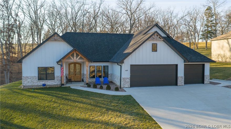 Step into effortless living with this immaculate, newer single-level home designed for comfort and style—no stairs, no hassle. The spacious open floor plan offers 3 bedrooms, 2.5 baths, and an oversized attached 3-car garage, giving you plenty of room to live and entertain. At the heart of the home, the chef-inspired kitchen shines with high-end appliances, generous storage, sleek quartz countertops, and a breakfast bar that flows seamlessly into the dining and living spaces—perfect for gatherings or quiet nights in. 
Outdoors, enjoy a beautifully landscaped yard overlooking the 17th green of the Cove Golf Course, creating a peaceful and picturesque setting. Located within the sought-after Four Seasons community, residents enjoy access to exceptional amenities including indoor and outdoor pools, playgrounds, tennis courts, a fitness center, boat storage, and more. Blending serenity with convenience, this home sits on a welcoming street known for its strong sense of community and friendly atmosphere. Experience the best of modern living and the Lake of the Ozarks lifestyle—this is one you won’t want to miss.