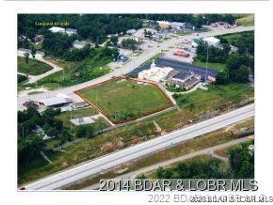 Flat and ready to build this 3 + acres that sits high above Hwy 54 for excellent visibility and business identification. Interchanges for ingress and egress to highway 54 are on either side of the property, which makes this a unique opportunity for future development.