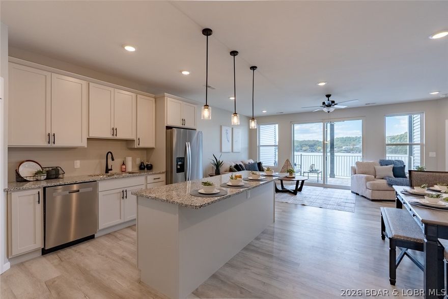 Located at the 3 MM of the Big Niangua, just past “Four Corners,” this premier lakefront development offers a rare, level landscape that puts you right at water’s edge. Easy access to pool area w/restrooms, perfect for relaxing, and take advantage of an unbeatable location close to lake hotspots, shopping, dining, and more. These 3 bed, 2.5 bath condos offer approx. 1,515 sq. ft. of thoughtfully designed space with upscale finishes, an open-concept layout, and large windows showcasing panoramic lake views. The lakeside primary en-suite features walk-in shower, double vanities and large closet. Amenities include elevator, lakeside pool, and boat slips available up to 14x40 plus PWC slips with drive-on lifts. Whether you're seeking a weekend getaway or full-time living, Niangua Commons delivers location and lifestyle at the Lake of the Ozarks. Conveniently located near some of the lake’s most popular hotspots, including The Cave Bar & Grill and Nautifish Rum Bar, Niangua Commons offers the ideal combination of relaxation and entertainment. Experience lakeside living at its finest! Don’t miss your chance to own at the lake’s newest premier address! Interior photos from Model #3C