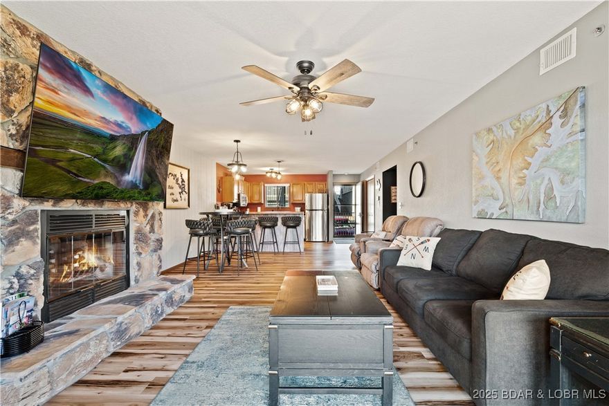 Lazy Days Condos at Lake of the Ozarks in Osage Beach offers a beautiful unit with only a few stairs from the parking lot. This fully furnished 2-bedroom, 2-bath condo includes a highly desirable 10x28 boat slip and has been tastefully updated. Both bathrooms have been fully remodeled w/state-of-the-art, top-of-the-line finishes, featuring modern vanities, heated floors and upgraded fixtures, along with stylish interior doors and interior enhancements. The kitchen features all new appliances, and nearly all furnishings have been replaced. Two new Tvs, lake-life décor, custom signage, and an original painting of the lake displayed over the couch, and new LakeLife patio furniture is included, kayaks, linens, bath & beach towels, cookware, small appliances, making this a truly turnkey property ready to enjoy immediately. Centrally located by land & water in the heart of Osage Beach, just minutes from shopping, dining, and attractions, this condo is perfect as a private getaway or income-producing rental. Amenities include two pools, playground, boat ramp, trailer parking, dog park, a lakeside boardwalk, all surrounded by the natural beauty of the State Park!