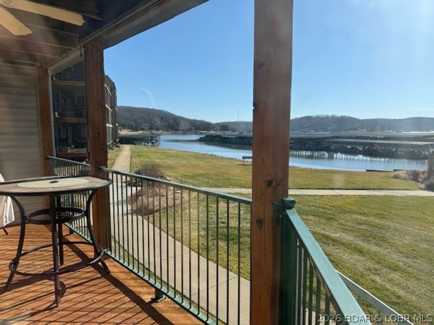 Sharp 2-bedroom, 2-bath condo with Lakeview & lake access. Includes a 10 x 24 slip with lift. Well maintained and turnkey with covered deck. Open layout features a large living room, inviting dining area & generous bedrooms. Views of the lake right outside the living room and primary bedroom. You will love the Cedar Glen Community's beautifully landscaped complex which offers resort-style amenities like pools, a playground, boat ramp, and trailer parking all on site.  Located near local favorites like Ha Ha Tonka State Park, Lake Valley Golf Club, and Old Kinderhook Resort, this is more than just a condo--it's your gateway to lakefront living & enjoyment. Don't miss your chance to own a piece of paradise!