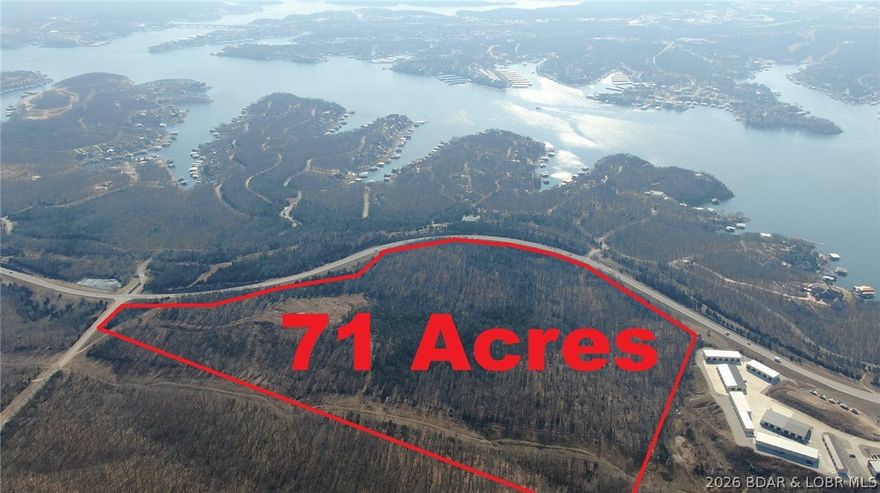 LAKE OF THE OZARKS DEVELOPERS - Available Now: OUTSTANDING CENTRAL LOCATION offering 70 ACRES, zoned commercial and located directly across the highway from The Villages at Shawnee Bend clubhouse. The possibilities are endless because of the current commercial zoning status and the likelihood of ease of rezoning Single or Multifamily Residential. Or whatever suites.