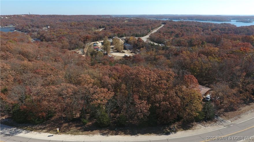 Conveniently located across the street from the Lake Ozark Police Department and the park, this lot offers exceptional visibility and easy access to community amenities.
