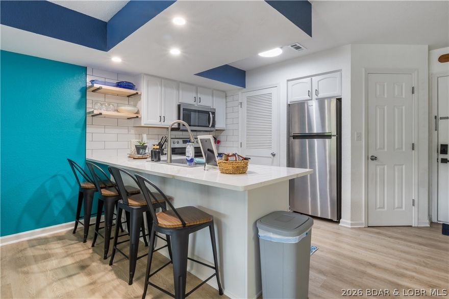 Completely renovated and move-in ready, this beautiful 2 bed, 2 bath Lake of the Ozarks condo offers comfort, convenience, and investment potential all in one! Located in a centrally situated community just 5 minutes from the Strip, this unit features all new appliances, flooring, fixtures, kitchen items, and furniture.

The condo includes 3 beds total (King, Queen, and Full) and is a rare find with only 7 stairs to the unit. Enjoy excellent community amenities including a heated/chilled pool (May-October), swim dock, 2 pet area locations, and an included 12x32 boat slip.

Currently operated as a rental for family, friends, and community members, this property offers the opportunity to continue rentals for immediate income or enjoy it as your own fully updated lake getaway. A turn-key property in a prime location with everything you need to start enjoying lake life right away!