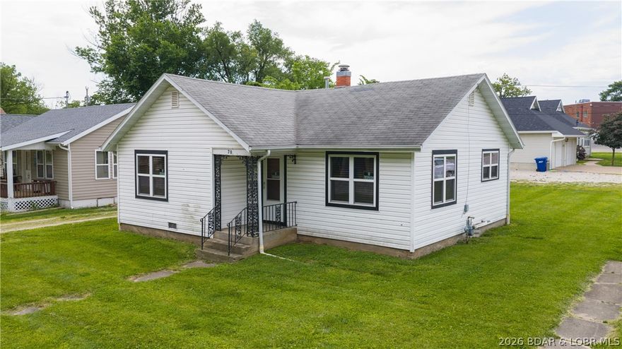 Located within the city limits of Camdenton, this charming 2-bedroom, 1-bath home offers 858 square feet of comfortable living space and sits on a desirable corner lot. Major updates were completed in 2016, including a new electrical breaker box and updated wiring (excluding light fixtures), high-efficiency furnace, updated cabinetry and countertops, newer windows and doors, and plumbing replaced from the meter to the home. The functional layout makes great use of the space while offering a clean, updated feel throughout. Conveniently located near Camdenton amenities, shopping, restaurants, and schools, this property is ideal for a variety of lifestyles. Don’t miss the opportunity to own this home in a convenient in-town location!
