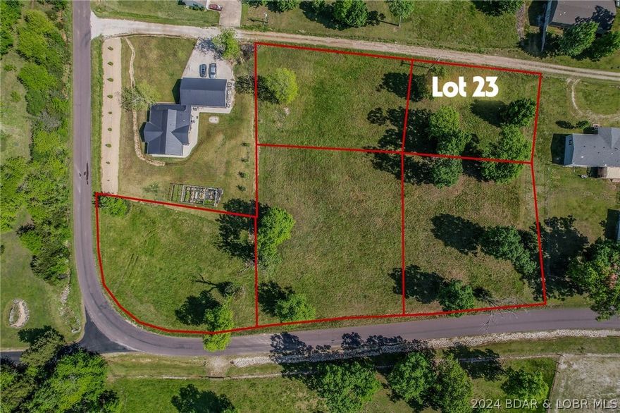 Great lot to build that walk out basement home on! Fronting Oak top Rd. Great part of the lake located at the 3mm of the Gravois arm and super close to all that Laurie has to offer. Lots in this subdivision are selling fast and lots of new building going on. Johnsons Bay offers community water and sewer! A lakes access community also offering subdivision boat ramp! Come check out this lot today and bring your house plans!
