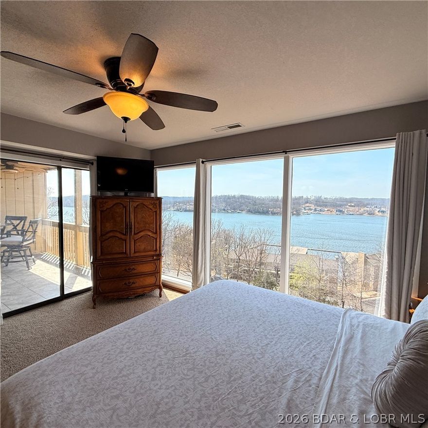 Wake up to some of the best lake views at Bay Point Village. This freshly painted, rental-ready unit is move-in clean and positioned just steps from the upper pool—making it as convenient as it is inviting.

No to-do list—just pure enjoyment from day one. Spend your mornings fishing, your afternoons enjoying the amenities including a new community fire pit, and your evenings unwinding.  The beautifully tiled balcony will be your new happy place overlooking a peaceful, park-like setting and calming lake views. Retire to the generous primary en suite with floor to ceiling windows, and a large walk in closet. Your guests will rejoice at the tranquil second bedroom and guest bathroom. This is low-maintenance lake living exactly the way it should be.