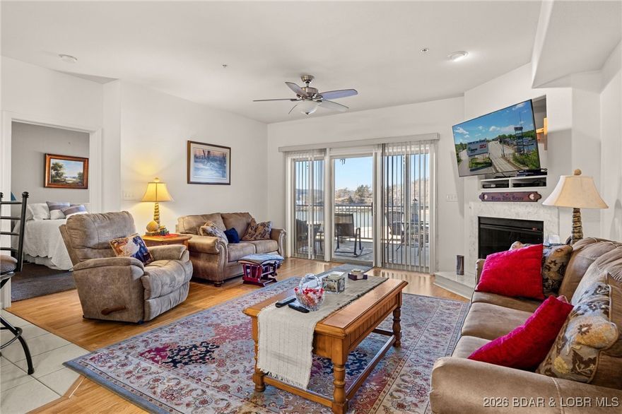 Enjoy peaceful lake living in this beautifully situated 3-bedroom, 2-bath condo tucked away on a quiet cove in Camdenton. Perfect for full-time living, this home offers the ideal blend of tranquility and convenience—just minutes from town, shopping, dining, and area golf courses.

The open living area features a cozy fireplace and flows seamlessly to a screened-in porch, perfect for relaxing and taking in the serene cove views. The unit is partially furnished, all kitchen dishes, pots and pans included making your move-in easy and stress-free.

Boaters will love the 12x30 boat slip, private storage unit, and elevator access—with the unit conveniently located just one floor up from parking. Residents also enjoy access to a community pool and community fire pit park area, adding to the low-maintenance lifestyle.

Whether you’re looking for a comfortable primary residence or a lake home that truly feels like home, this condo delivers space, convenience, and a peaceful setting on the Lake of the Ozarks.