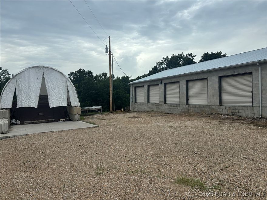 Welcome to your next investment opportunity! This unique property offers endless possibilities with warehouse and/or storage units for sale with 18 private bays with concrete block construction, on .5 acre on Hwy D. The prime location of this property makes it an ideal space for a variety of businesses or development projects. Don't have to be concerned about zoning being located in Miller county but just minutes from Osage Beach Parkway by Prewitt's Point. There is plenty of opportunity from creating your own storage areas for your items, vehicles or whatever type of products/equipment or renting out the additional units to supplement this purchase later. This is a rare location right outside the city limits of Osage Beach, located just a couple of minutes away from HyVee & Lowes right down D Road. Don't miss out on the chance to own a piece of real estate with great potential in this growing area. Call today to schedule a showing and begin envisioning the future possibilities for this incredible property.