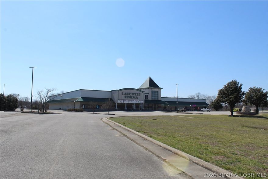 Rare commercial opportunity in the heart of Laurie. With 10.68 acres, approximately 27,662 square feet, and 1,200 feet of frontage on Hwy O, across from the golf course, this prominent property delivers the visibility, access, and scale investors look for. Anchored by a well-established 5-screen cinema, the site also features multiple retail spaces, a restaurant location, and a standalone ATM tenant. Level ground, multiple pad sites for expansion, 100+ parking spaces, city sewer, electric, Co-Mo fiber optic internet, and city water coming in April 2026 add to the appeal. Seller will provide a 5-year lease for the cinema at closing, offering built-in income potential. Cinema business and equipment are not included.