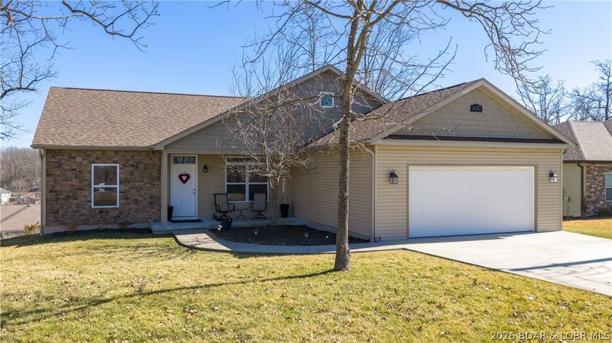 Why buy a condo when you can own a house?!  Look at this 3 bedroom, 2 bathroom house/villa with a beautiful LAKE view?  Walk or take a short golf cart ride to the Port Royale community docks and your 14'x36' slip and PWC slip are right down the hill.  Enjoy access to the Port Royale community pool too! This home sits on a flat lot with irrigation system, an invisible pet fence, a flat driveway and a two car garage.  It's your's, you don't have to share it with anyone.  Take your favorite beverage out on your deck and soak in a view of the lake while you grill dinner.  Inside is a spacious, well appointed kitchen, a large family room and a primary bedroom that will please the most discerning buyers.  Two more nice sized guest room and an additional non conforming bedroom (no closet) all on the same level.  A clean, bright guest bathroom for your guests to enjoy.  Don't wait to tour this terrific home, it's ready for summer fun! CALL YOUR REAL ESTATE PROFESSIONAL TODAY!