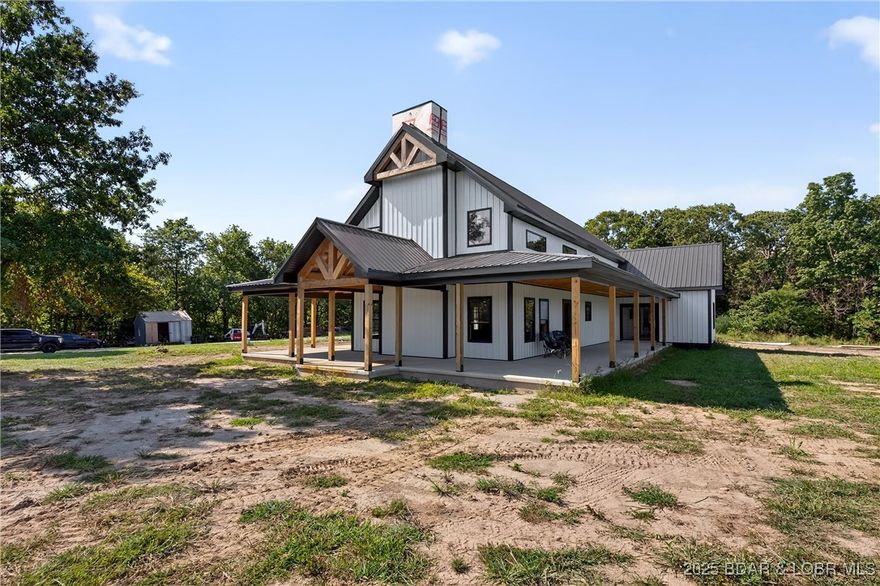Country dream home loading…….. This custom built modern farmhouse is framed, sided and moving through the finishing process, but get involved now to make it your own! Just minutes from town, between Lincoln and Warsaw, this impressive structure sits just off state maintained blacktop on a beautiful 4+/- acres. 2,850 sq feet of well thought out design, gives you ample room for you and yours to enjoy! Master suite layout that dreams are made of, large guest room, laundry room and walk- in pantry all play 2nd fiddle to the MASSIVE great room with TONS of natural light and HUGE vaulted ceilings. Custom cabinets overlooking your dining space and living area with a large fireplace make up an area that will be sure to impress! Early morning sunrises or late evenings will both be enjoyed on the beautiful 10’, concrete wrap around covered porch, overlooking your slice of paradise! Wait! We aren’t done! Upstairs there are two very good sizes bedrooms with another bath. Owner has list of all standard planned finishes and list of upgrades available for you to put your stamp on this beautiful dream home as they finish it! Call today for more details!