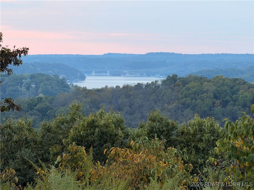 Multiple Lots Sold Together – Exceptional Builder & Developer Opportunity! This rare subdivision offering is located in Bayview Estates, a quiet, well-established community on Y Road, just minutes from Camdenton and Osage Beach in one of the fastest-growing areas at the Lake of the Ozarks. The subdivision offers sewer and water with low impact fees, making it a cost-effective project for builders and developers. Several lots are very flat, while many offer breathtaking panoramic lake views. These large parcels are ideal for a long-term subdivision near the old golf course by Sylvan Bay, with strong resale potential in a highly desirable, centrally located area between the Lake’s two largest population centers. With infrastructure in place and incredible lake vistas, this is an outstanding opportunity for a multi-year development project with strong future demand. Don’t miss this dynamic opportunity at the Lake of the Ozarks.