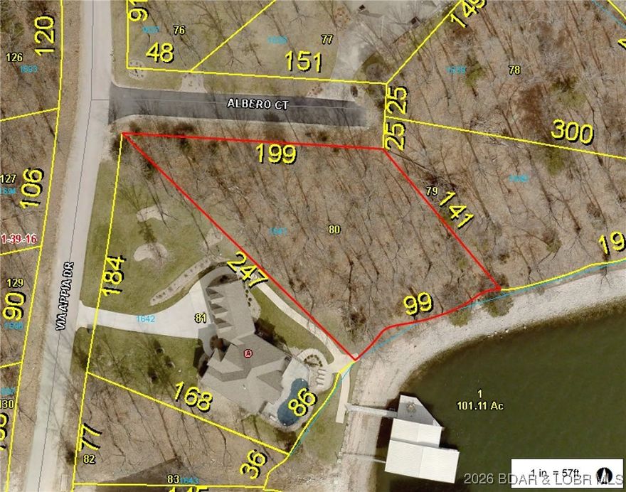 Imagine waking up to breathtaking main channel views on this large, treed lakefront lot in prestigious Porto Cima. This gentle lot is the perfect canvas for your custom dream home: expansive building envelope for a truly large estate, south by south-eastern exposure ideal for a sun-drenched pool, protected cove for calm docking and swimming, and private cul-de-sac access ready for a gentle driveway. No steep terrain challenges here. Picture it: soaring windows framing sparkling lake views, multiple levels of lakefront living, effortless circle drive welcoming guests, and endless sunrises and sunsets over the lake. In world-class Porto Cima, elevate your lake lifestyle with optional golf, yacht club, and more. Your vision becomes reality here. Don't miss this rare gem. Claim your piece of lake paradise today!