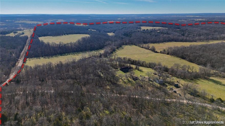 Step into quiet beauty of the Missouri countryside with this 308-acre property, ideally located just 30 minutes from the Lake of the Ozarks. Offering a rare blend of productivity, water, & recreation, this land is well suited for agriculture, hunting, or a private homestead. Over 80+ acres of open pasture currently produces more than 180 round bales of hay annually, providing a strong foundation for a cow-calf operation/hay production. This property is exceptionally well-watered, featuring a year-round pond & a substantial wet-weather creek, supporting livestock & attracting abundant wildlife. The remaining acreage offers timber, cover, & seclusion, creating excellent hunting opportunities & a peaceful rural setting with long-term land value. A 100-year-old farmhouse and several older barns remain on the property, adding historical character & potential for restoration. The main barn is equipped with water & 220-volt electric service, offering functional value for future improvements. Whether you’re looking to expand an ag operation, or invest in a large tract of Missouri land near the Lake of the Ozarks, this property offers space, resources, & the opportunity to make it your own.