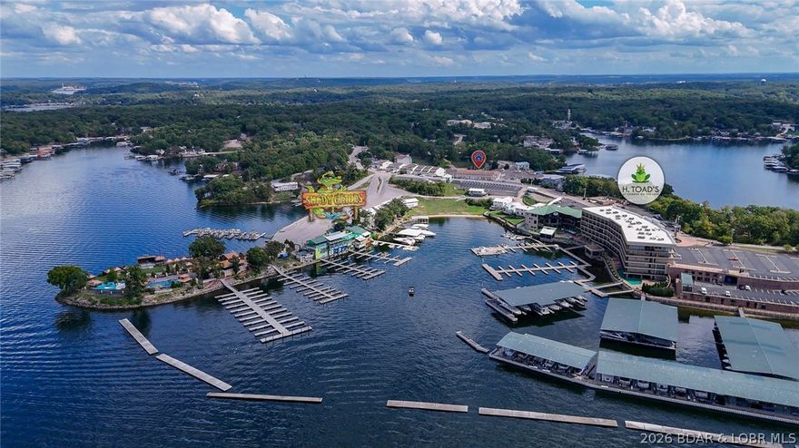 Looking for a condo close to ALL the action? This 2BR/2BA condo is located in the heart of some of the BEST entertainment, dining and nightlight at the Lake of the Ozarks. Being just steps away from Camden on the Lake, The Toad and Shady Gator/Lazy Gator, you will have plenty of options to choose from. Updated in 2021, this condo has luxury vinyl flooring, newer appliances, fixtures and paint. The water heater and HVAC are newer, within 2 years! With lake views on both sides on the unit, you are sure to enjoy your morning coffee or an evening cocktail. Don't miss your opportunity to snag this property. Schedule your tour TODAY!