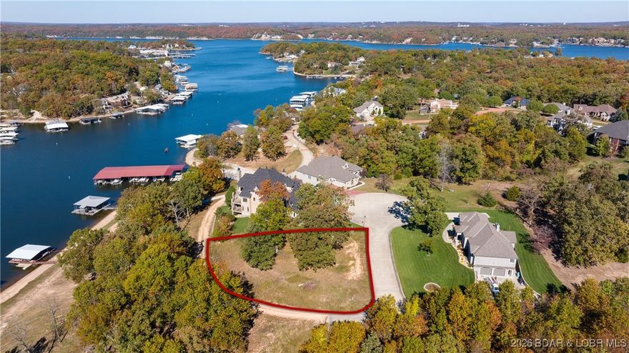 Thinking of building your dream home, then you need the perfect location to do so. This Lakeview, corner Lot is nestled within a gated community full of pristine homes. Located in Osage Beach, you will love the close proximity to the hospital, schools, shopping, golf, and much more. Once you enter through the gated entrance, the cobblestone streets will give your new home the entrance it deserves. Be sure to have your house plans ready as city water, city sewer, and electric are already in place. The gentle topography allows you to build any style of home desired.