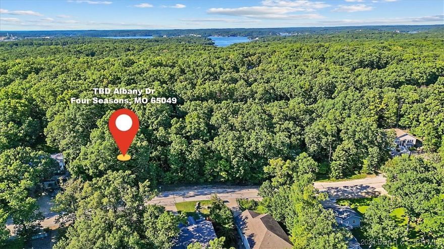 Location! Location! It’s all about the desired location on Horseshoe Bend. This 70 x 150 lot in the Four Seasons community comes with many property amenities such as pools, playgrounds, a fitness center, boat ramps and so much more to enjoy! With seasonal lake views and easy access to the road, this gentle lot provides the perfect opportunity to own property at the Lake of the Ozarks.