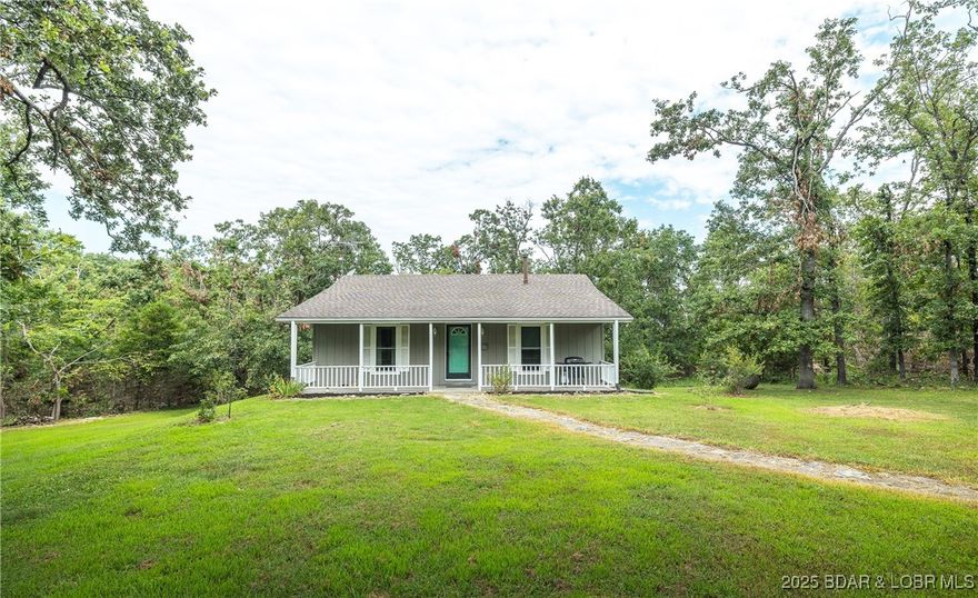 Private Country Retreat on 3.2 Acres Near Truman Lake
Enjoy the peace and privacy of secluded country living—this charming home is tucked away from view, offering a tranquil escape just minutes from town. Situated on 3.2 acres, there's plenty of space for gardening, outdoor activities, or simply soaking in the serenity.
 Main Level Features:
Spacious kitchen with pantry and sliding glass doors leading to a deck—perfect for entertaining or enjoying morning coffee.
Two comfortable bedrooms and a full bath upstairs.
Finished Walkout Basement:
Expansive rec room ideal for gatherings, hobbies, or a home theater.
Two additional bedrooms (with potential for a third).
Full bathroom for added convenience.
Detached 2-Car Garage:
Generously sized to include a workshop or extra storage.
Additional Highlights:
Private well and septic system.
Ample room for a garden or outdoor projects.
Just 6 minutes to Harry S Truman access at Long Shoal Marina.
Only 15 minutes to shopping, medical clinic, and veterinary services in Warsaw.