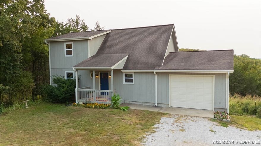 Enjoy lake living at its finest in this 1.5-story home overlooking the gorgeous waters of Truman Lake. This 2 bedroom, 2.5 bath property sits on just under an acre, offering the perfect blend of space, comfort, and convenience. Inside, you’ll find a functional layout with plenty of room to relax after long days at the lake. Outside, take in the view from your own piece of paradise. An attached garage and carport provide excellent parking and storage for vehicles, boats, and lake toys. If you’re dreaming of a Truman Lake getaway with unbeatable views and room to make it your own, this one checks all the boxes!