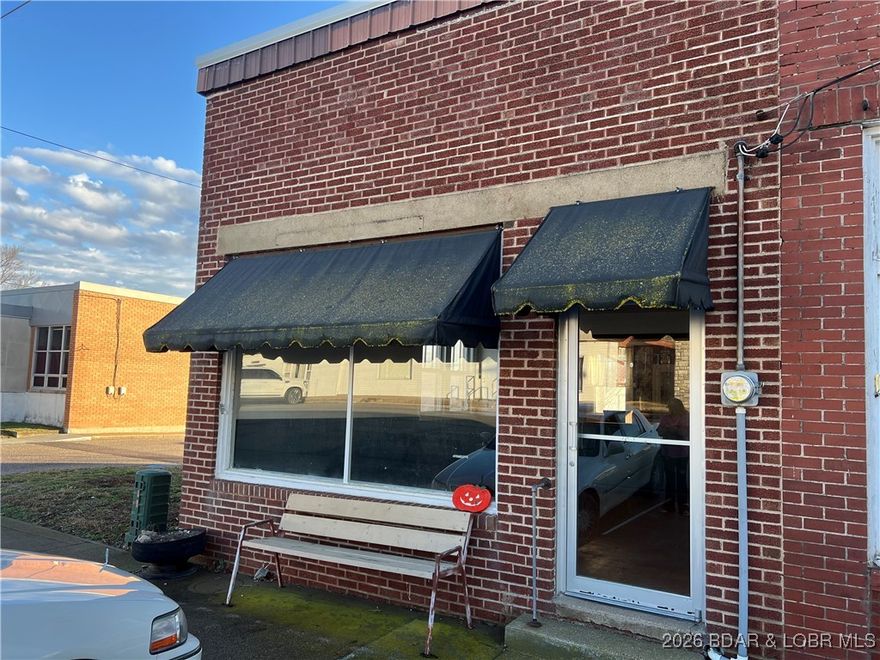 A lot of history in this old building. You will have endless possibilities with this one. Are you looking to get started in your own business and need a store front, well here it is. This building is in the historic downtown Stover. It would make a great candy store, bakery, retail shop or just office space. It is in need of some TLC but has had a new roof within last 5 years. Come take a look and bring all reasonable offers.