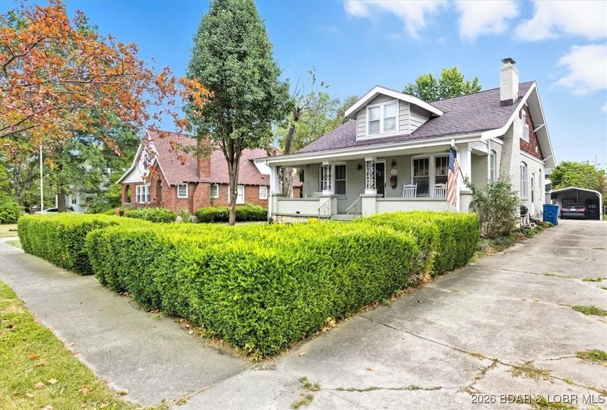 This distinctive bungalow offers timeless style in a highly desirable setting. Featuring 3 bedrooms and 2 bathrooms, the home showcases thoughtful details that give it a warm, welcoming feel. Hardwood floors, classic trim, and a charming brick exterior set the stage for interiors full of personality. The living room is both comfortable and impressive, complete with custom built-ins and a statement fireplace. A bright sunroom creates an ideal space to relax, read, or enjoy your morning coffee. The well-appointed kitchen includes abundant cabinetry, making it practical for daily use and gatherings alike. A covered front porch invites you to slow down and enjoy the quiet surroundings. Tucked away on a peaceful street while still close to shops, dining, and amenities, this home offers character, comfort, and convenience in equal measure.