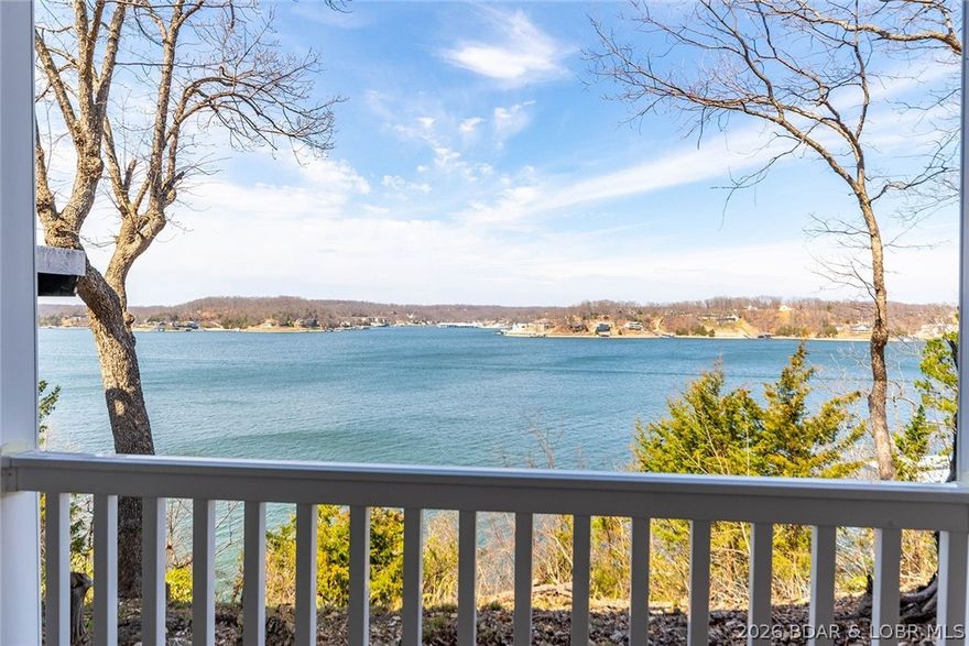 BEAUTIFUL lakefront condo with a STUNNING view of the main channel the moment you walk through the front door. This 2 bedroom, 2 bathroom condo offers you peace, comfort, and a great location. In the heart of Lake Ozark, you're minutes from fine dining, shopping and the strip by both land or water!  The kitchen features a large pantry, solid surface counter tops, and laminate flooring throughout the entire condo. Completely furnished and ready for you to walk in and enjoy the lake with no work and all fun! With no rentals, this quaint complex offers you a quiet place to enjoy the pool, your private patio overlookiing the water, and 15x30 dock. Come see just how much this condo has to offer!