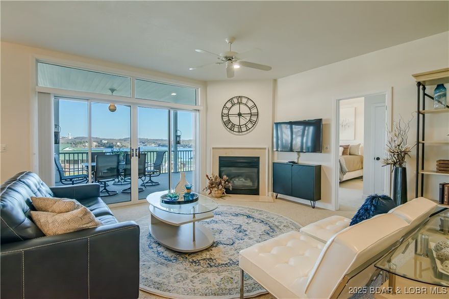 Welcome to this beautifully updated 3 bed, 3 bath condo in The Evergreens at the Lake, perfectly situated at the 18 MM of the Lake of the Ozarks. This ground-floor unit offers minimal steps, making it ideal for all ages and lifestyles. The condo is truly turn-key—everything you see stays, including stylish décor and furniture—so you can start enjoying lake life immediately.
Modern updates shine throughout with stainless steel appliances and recent upgrades to the HVAC, water softener, and water heater. The building’s roof was replaced last year, adding peace of mind for years to come.
Step out onto the massive screened-in back deck, perfect for entertaining or relaxing. From here, enjoy views of the pool and playground, allowing kids to play while you watch comfortably from home.
This condo includes a 12x28 boat slip with a 10,000 lb hoist—just bring your boat and hit the water. Even better, this listing offers a rare bonus no others in the complex have: a garage located just down the hill from the condo. Close to everything by land and water, this is lake living at its best.